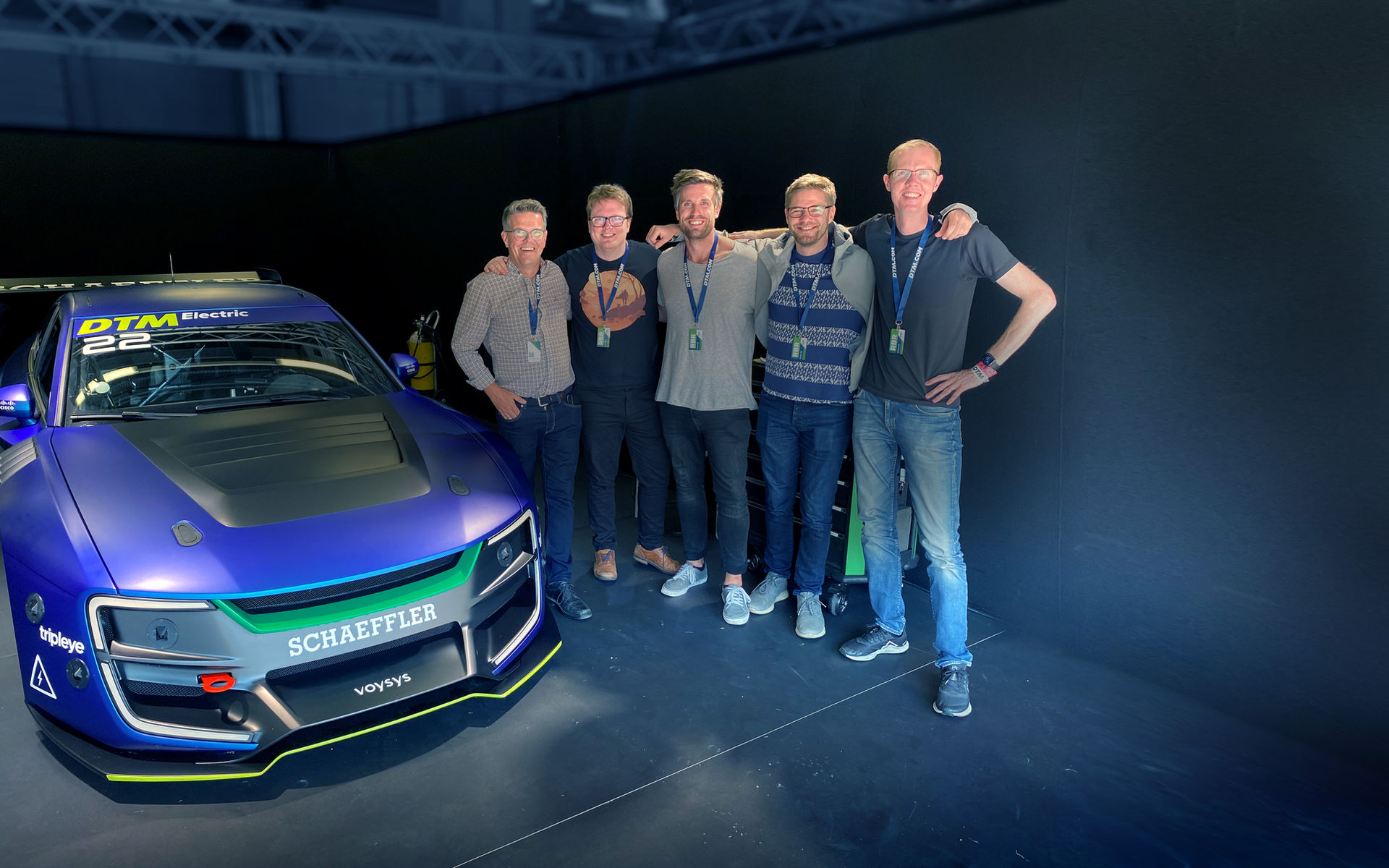 Team Voysys in front of a remotely controlled car