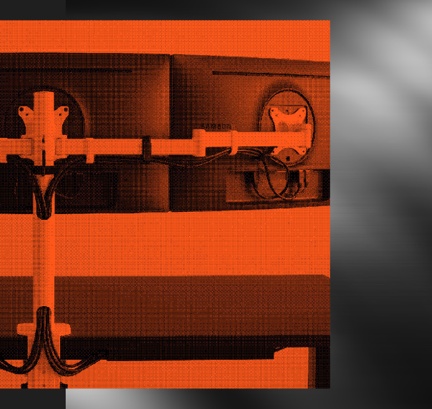 Close-up of hydraulic equipment with an orange brand-color overlay